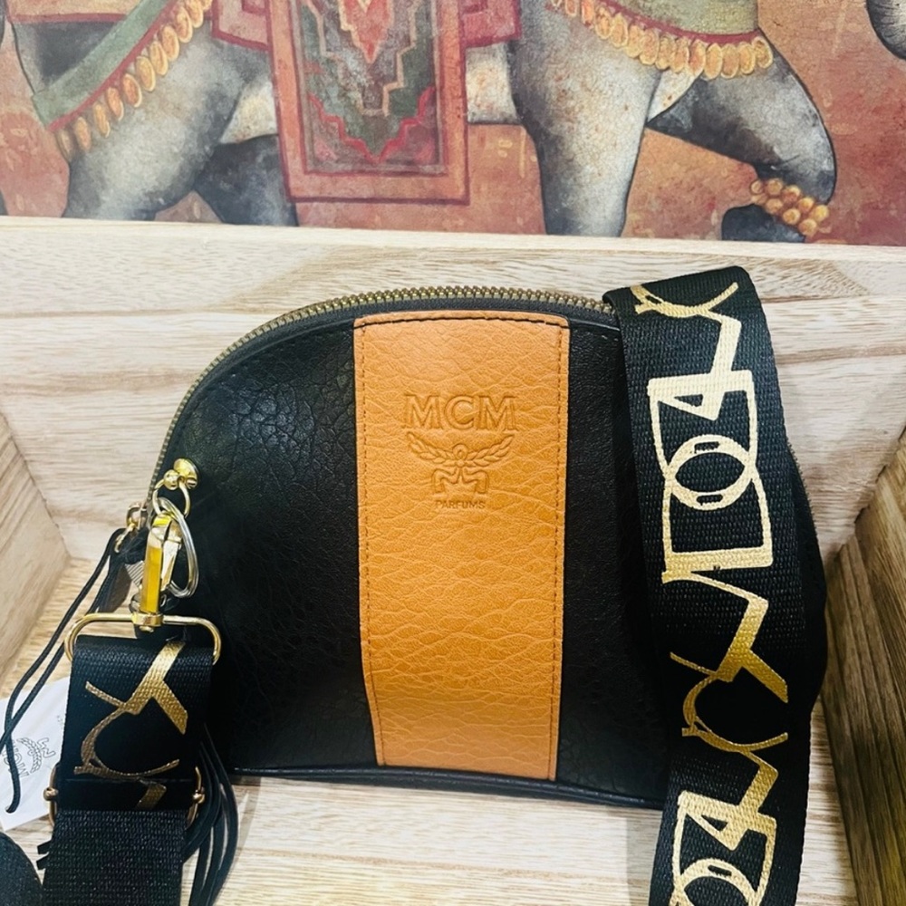Mcm pouch to crossbody bag